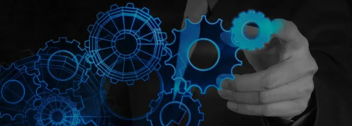 Hand adjusting a glowing blue gear, symbolizing custom system integration and process optimization