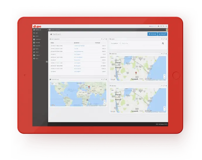 Screenshot of the E.ON Dashboard interface, displayed on a tablet, showing a backend system with a list of entries and three integrated map views tracking locations across the globe, including Europe and Tanzania.